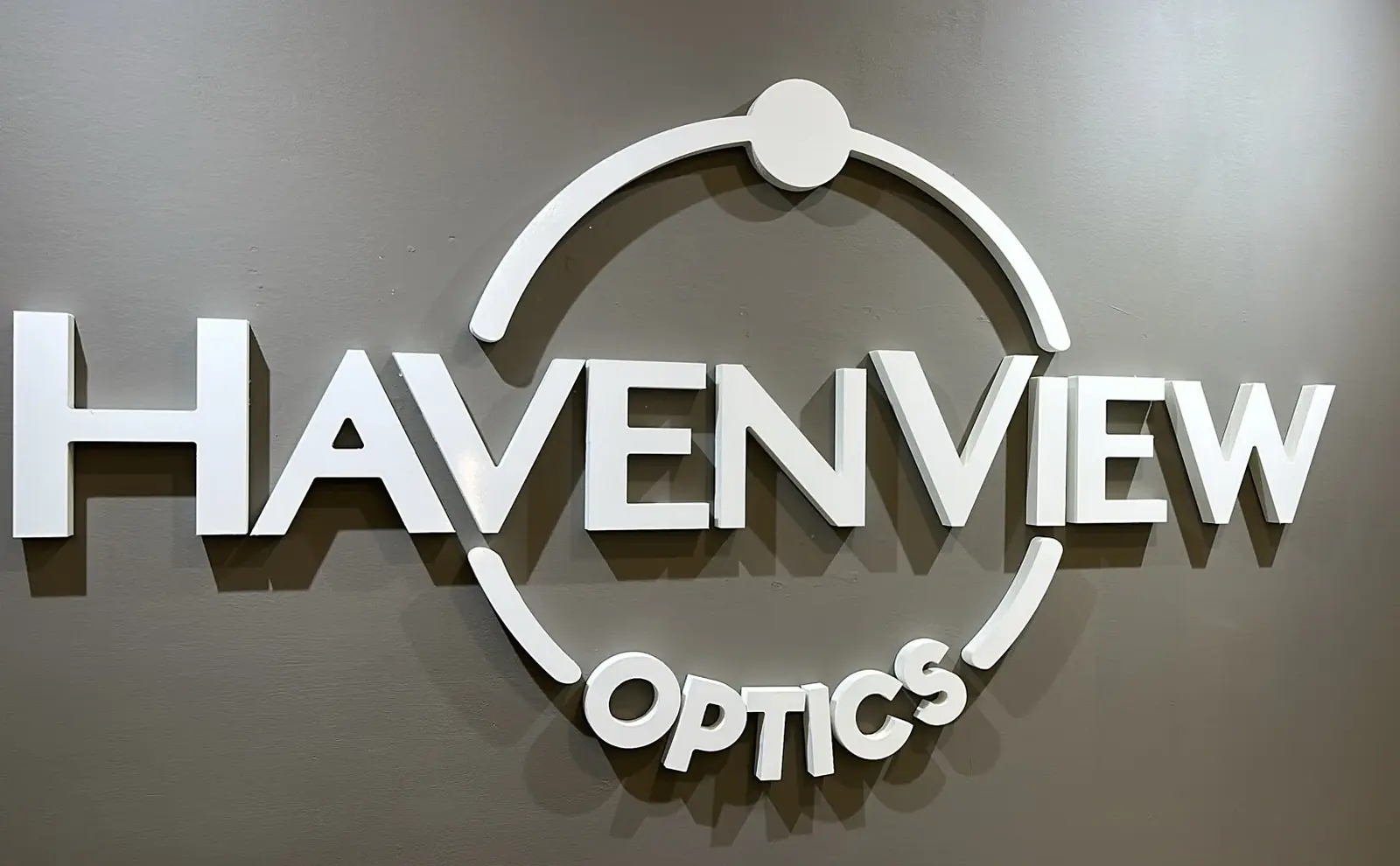 The Haven View Optics sign on the wall inside the Scarborough store
